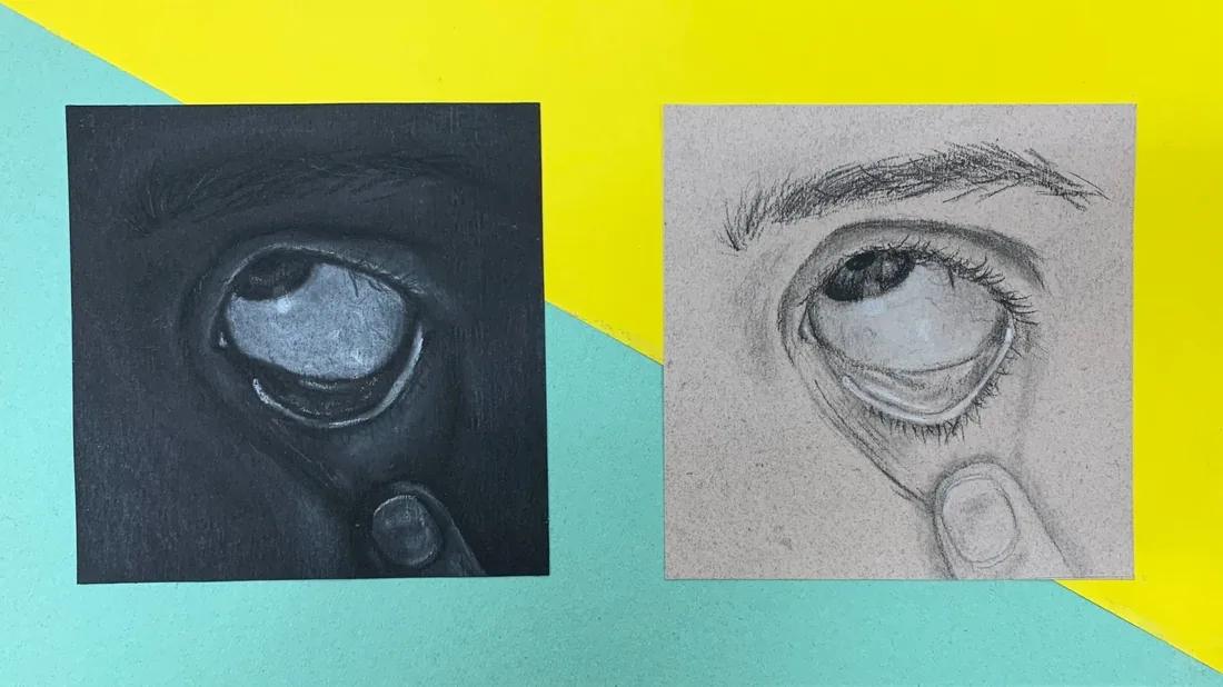 Two eye studies, one in white on black paper and one in graphite on tan paper.