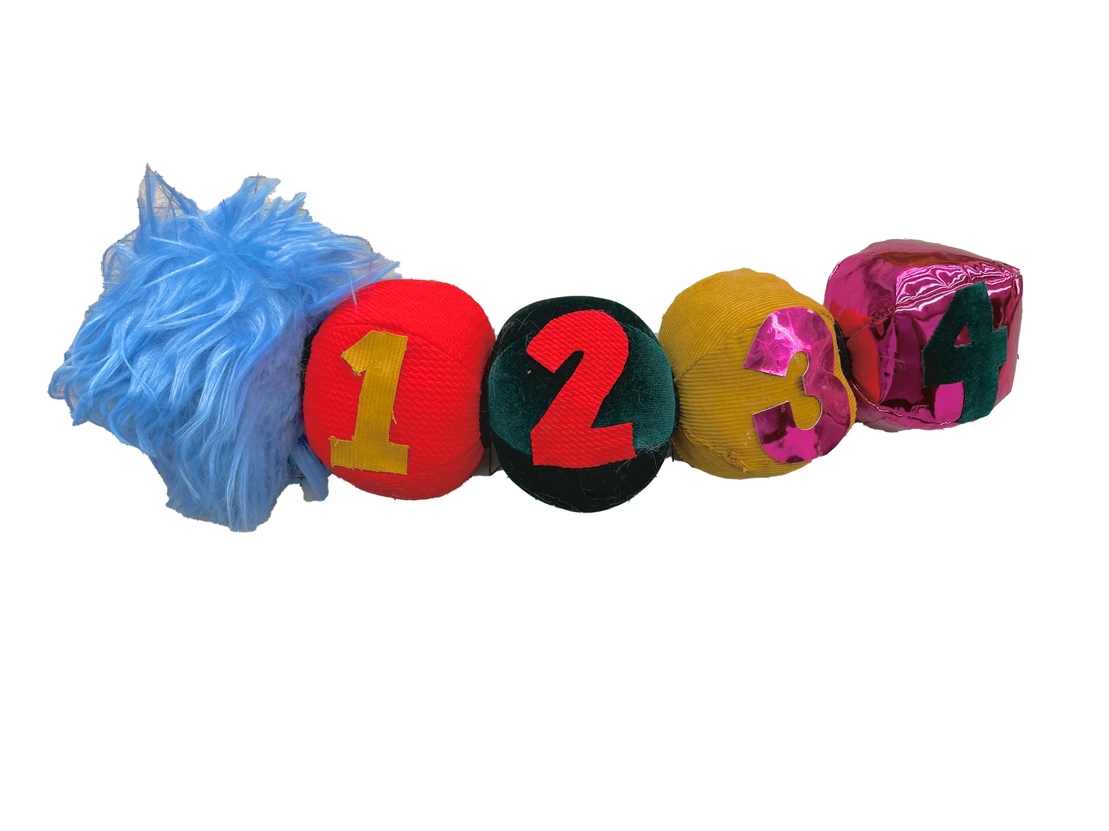The Cece caterpillar laid out straight: a fuzzy blue head followed by four segments numbered 1 to 4 in red, dark green, gold, and metallic pink, each a different fabric and texture.